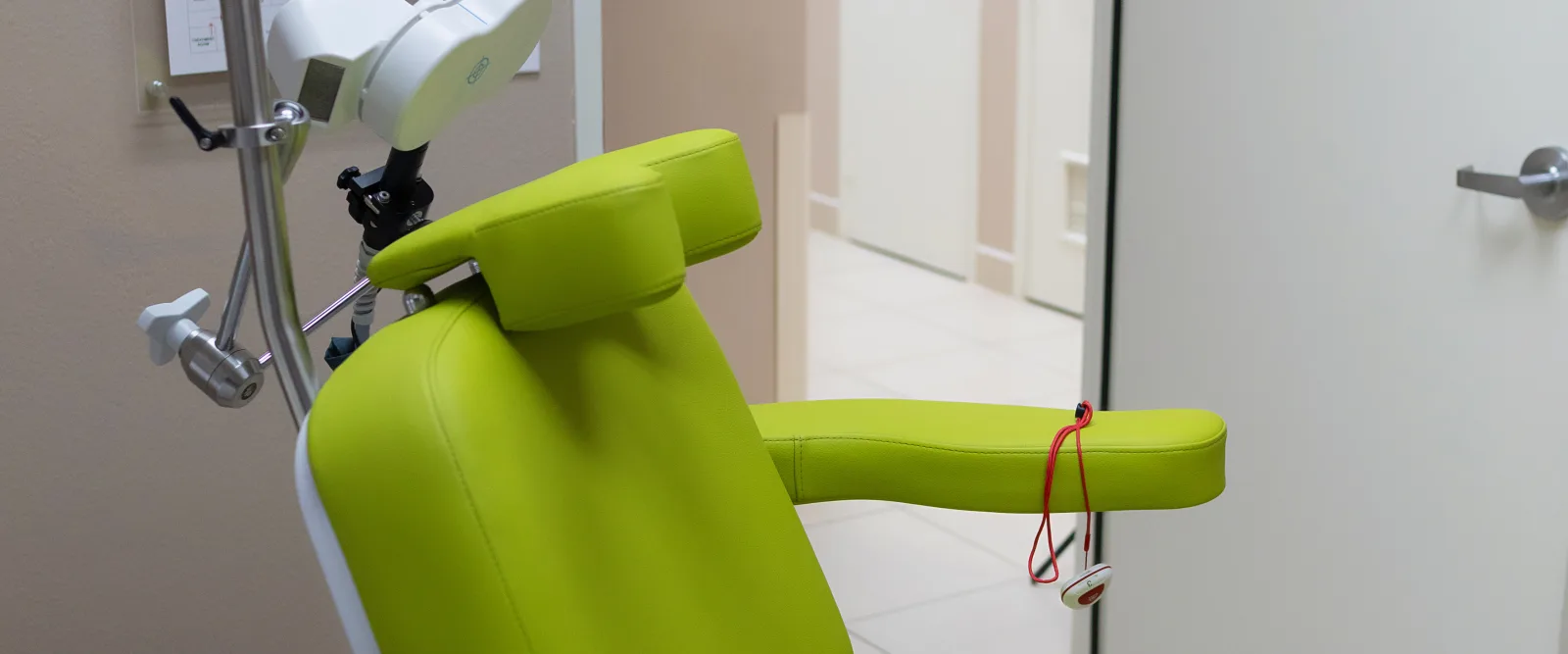 TMS treatment chair beside the KAIA Virtual Reality Therapy and neuromodulation research suite at Karma TMS